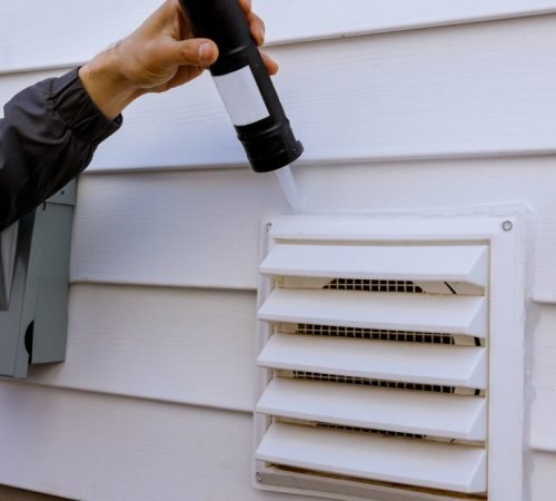 Dryer,Exhaust,Ventilation,Fan,On,Side,Of,House,With,Plastic